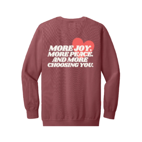 Crimson sweatshirt with white text and a red heart on the back
