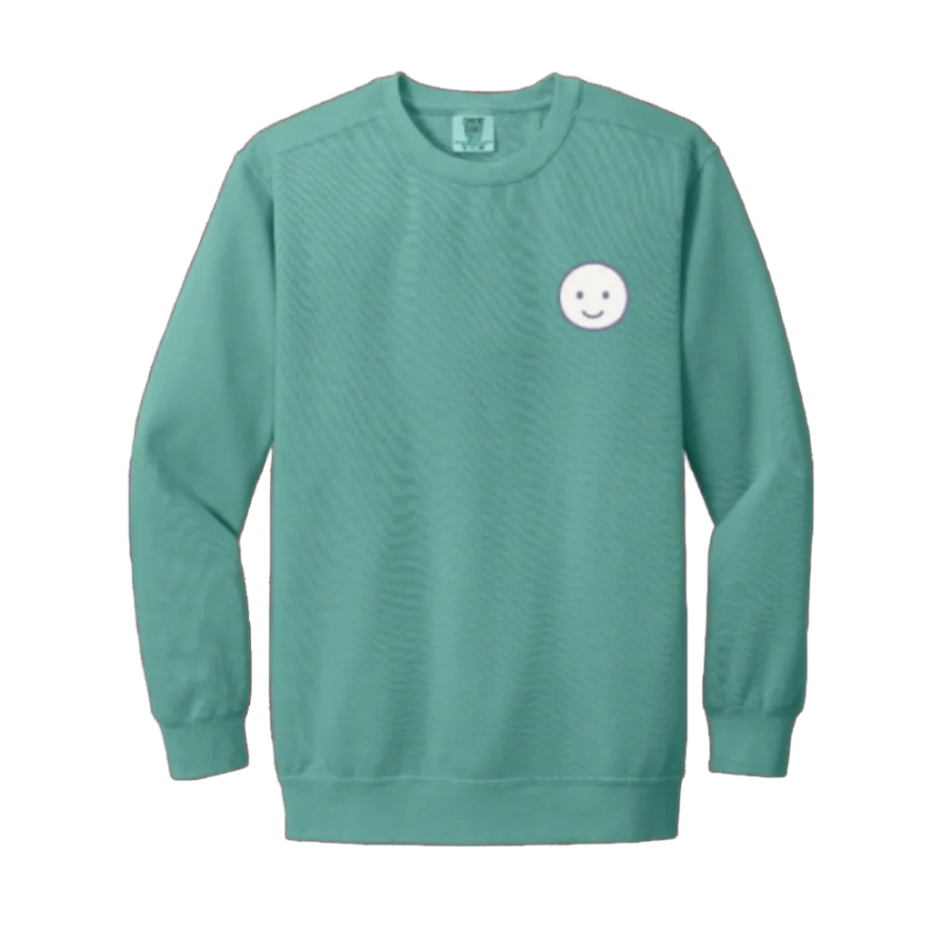 Seafoam sweatshirt with a smiley face design on a white background