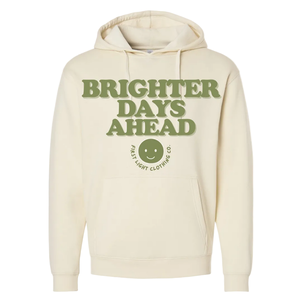 First Light beige hoodie with 'Brighter Days Ahead' text and smiley face logo on a white background