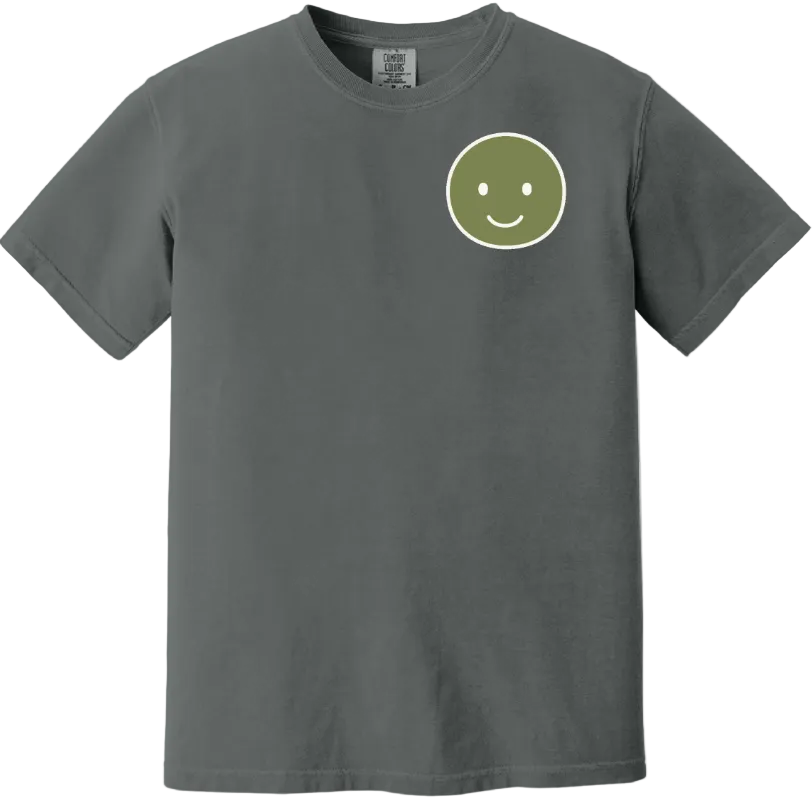 Gray t-shirt with a green smiley face design on a white background