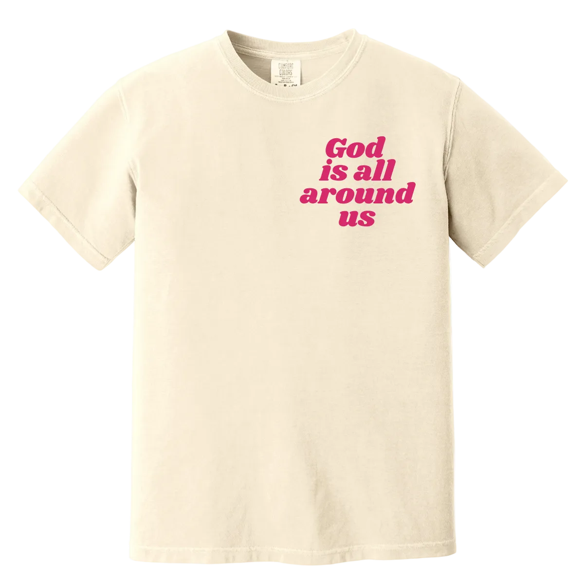Beige t-shirt with 'God is all around us' text in pink on a white background
