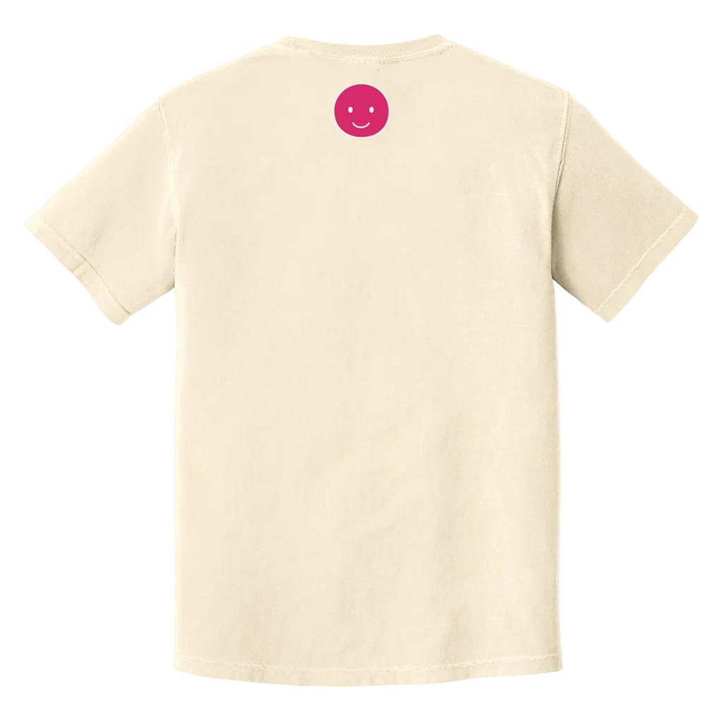 Beige t-shirt with a pink smiley face on the back against a white background
