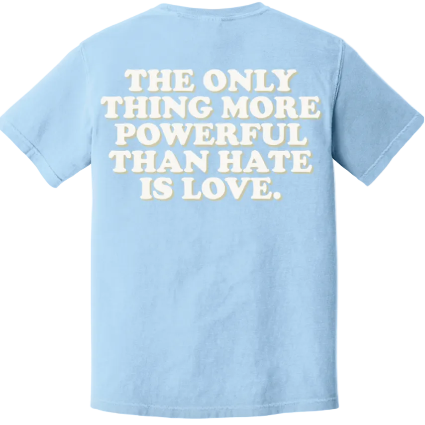 Light blue t-shirt with a motivational quote on the back against a white background