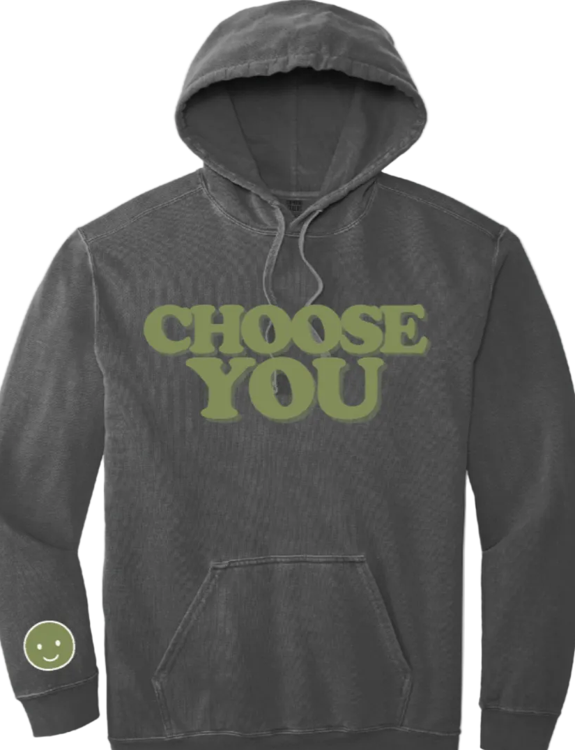 Gray hoodie with 'CHOOSE YOU' text and smiley face patch on sleeve against a white background