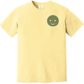 Yellow t-shirt with a green smiley face design on a white background