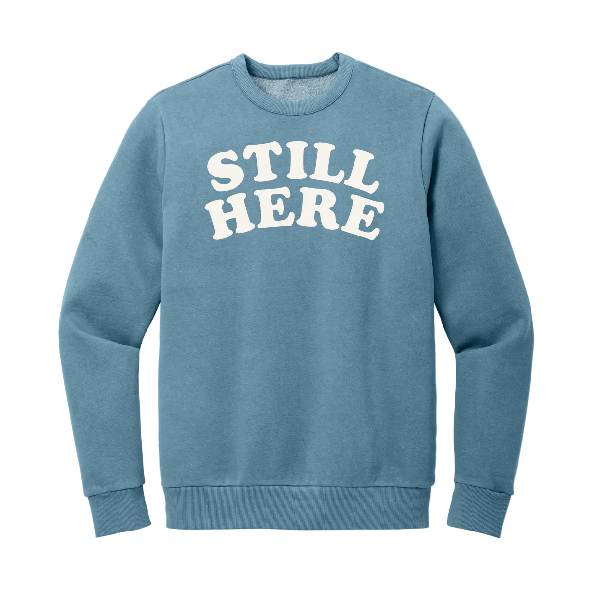 Blue sweatshirt with 'STILL HERE' text on a white background
