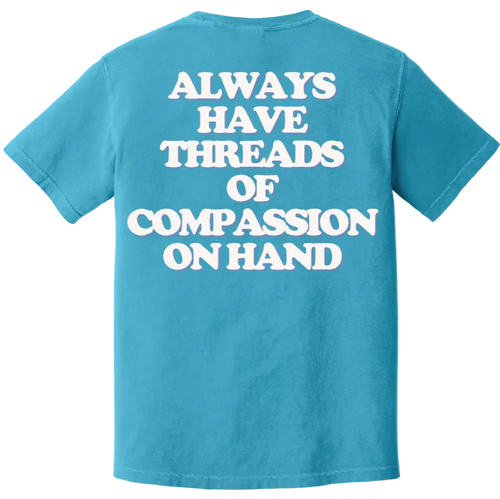 Blue t-shirt with white text on the back on a white background