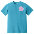 Blue t-shirt with a pink smiley face design on a white background