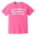 Pink t-shirt with white text and a pink ribbon graphic on a white background