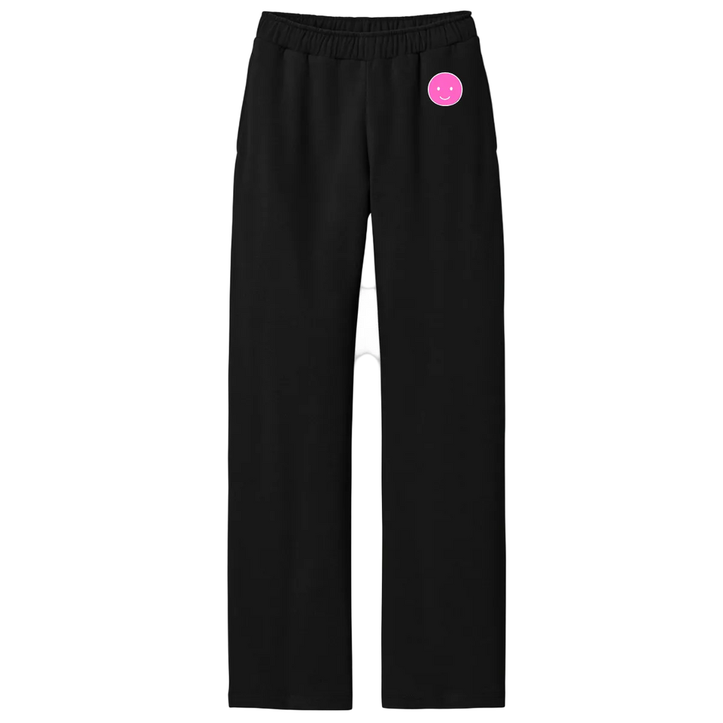 Black pants with a pink logo on a white background