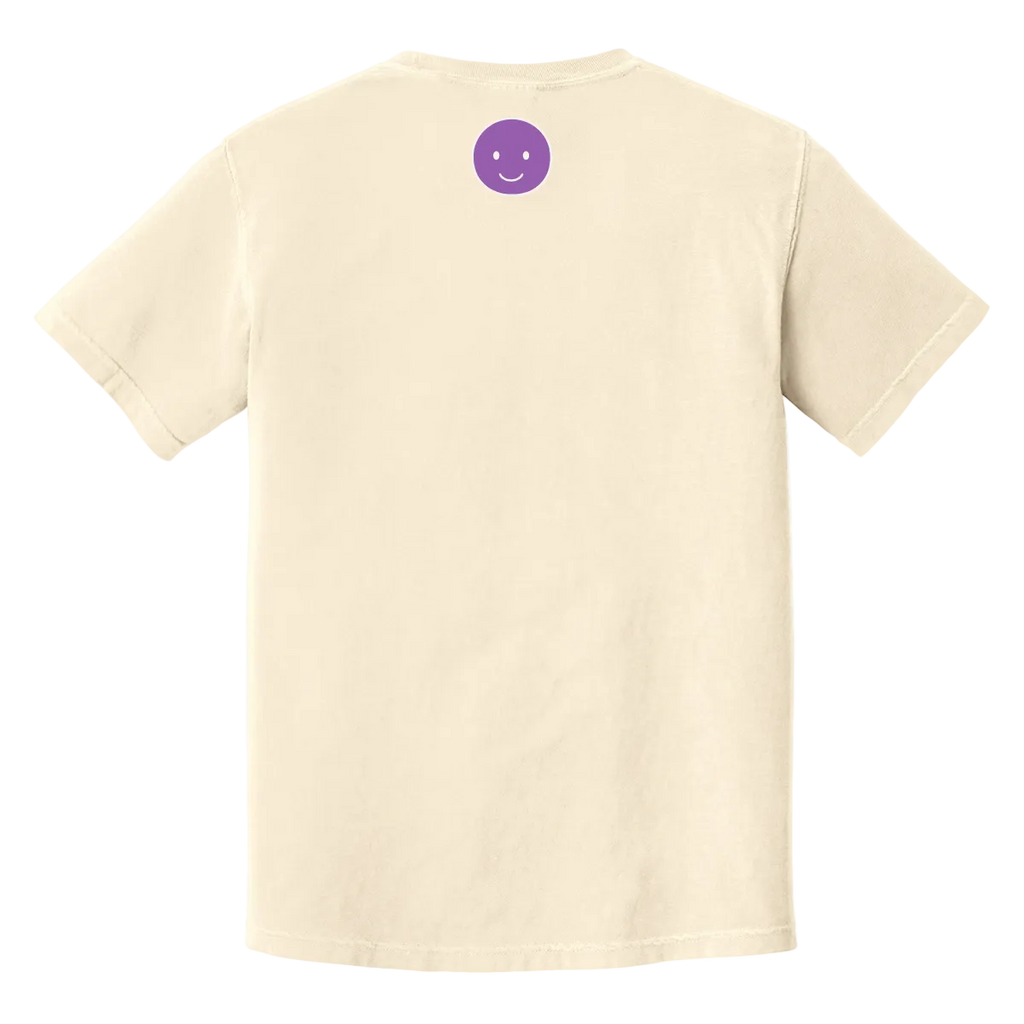Beige t-shirt with a purple smiley face on the back against a white background